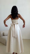 ivory-satin-midi-dress-spaghetti-strap-bow-back-a-line-dress