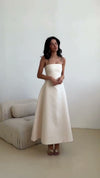 ivory-satin-midi-dress-spaghetti-strap-bow-back-a-line-dress