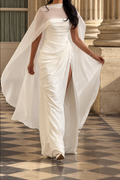 ivory-draped-high-slit-gown-sheer-cape-overlay-ruched-evening-dress
